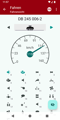 Screenshot der Fahransicht mit gro&szlig;em Tacho und Funktionssymbolen.